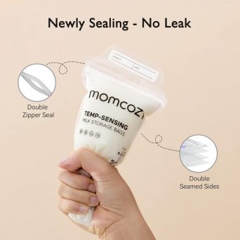 Momcozy Temp-Sensing Milk Storage Bag being squeezed to demonstrate the 